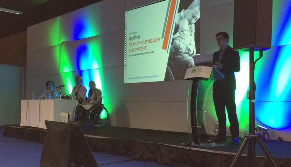 Staff member Andrew speaks at the 56th International Spinal Cord Injury Conference