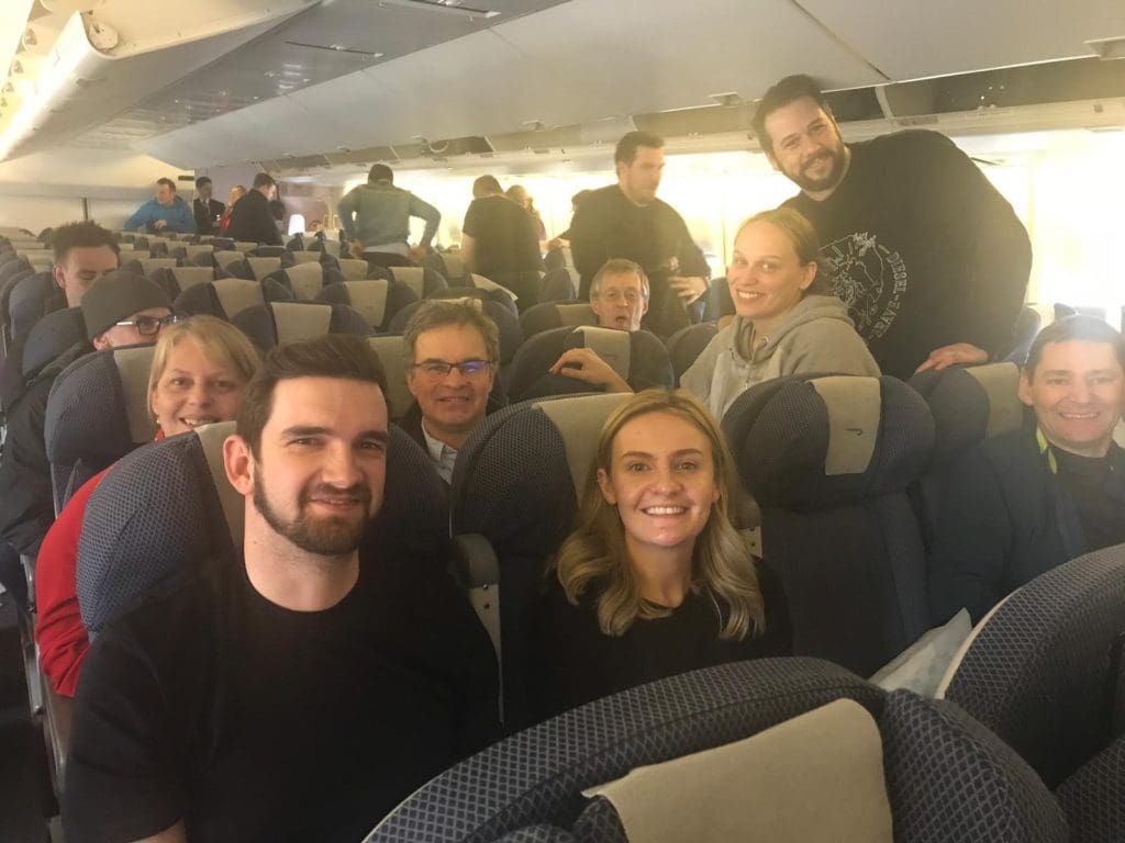 A group of our Colorado sit ski participants on a plane