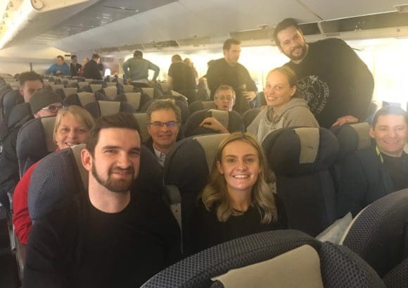 A group of our Colorado sit ski participants on a plane