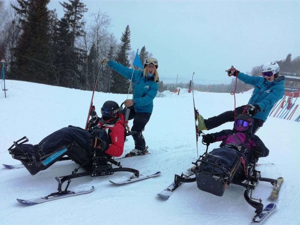 Nikki and other course participants posing for the camera on the Ski karting course in Sweden