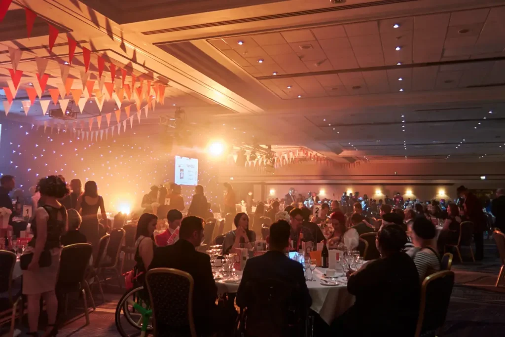 Everyone at their tables ready to enjoy their 3 course meal at Back Up Ball