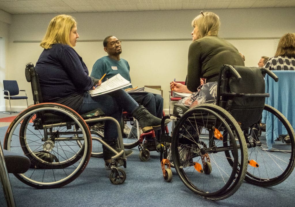 Lisa and other volunteers on a mentor training weekend