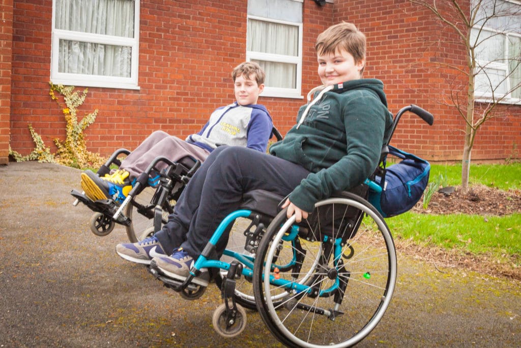 Sam, a young wheelchair user who we supported with education inclusion