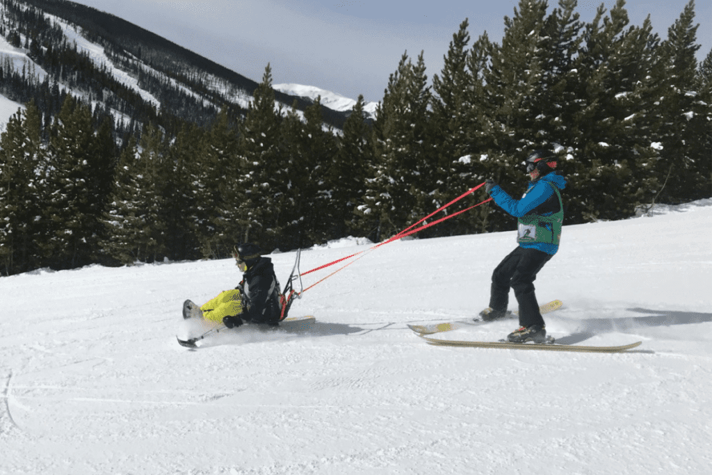 Ian sit skiing, enjoying some travel after spinal cord injuryy