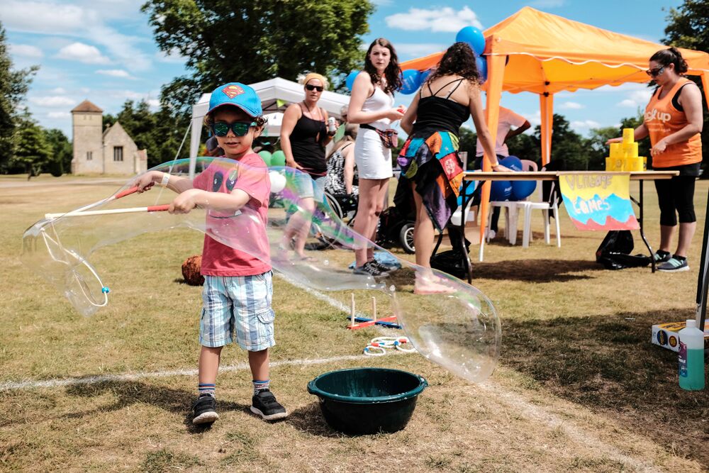 Children and adults having fun in the sun at Back Up Fest 2017