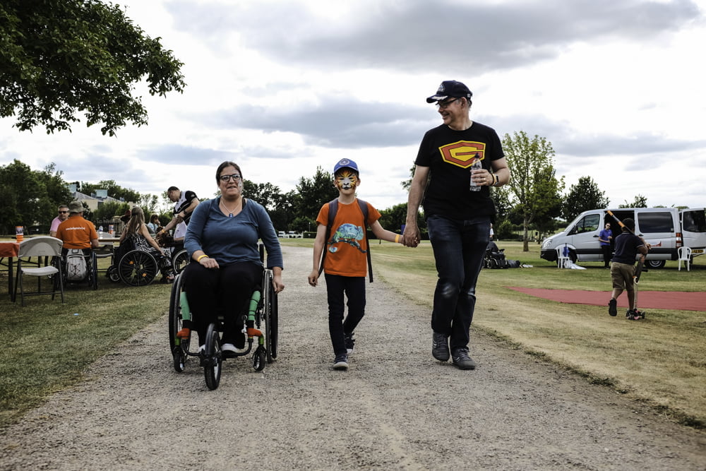 Photo of Mike and his son and wife enjoying family life at Back Up Fest