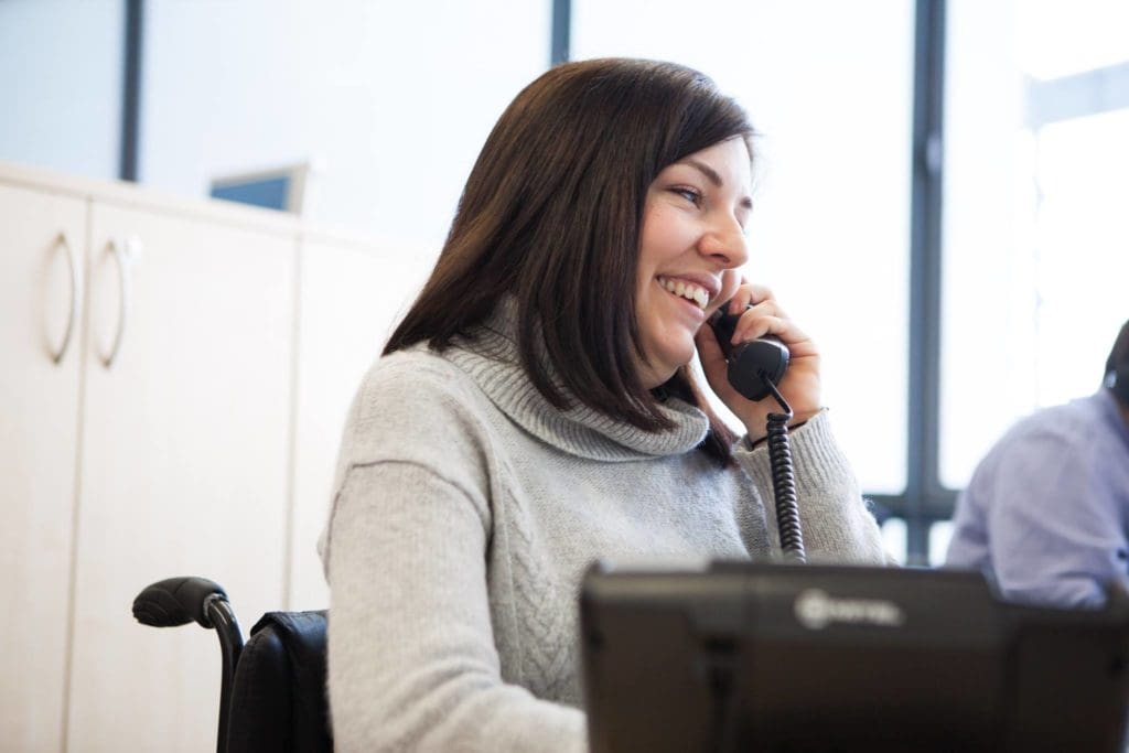 A member of Back Up staff answering the phone