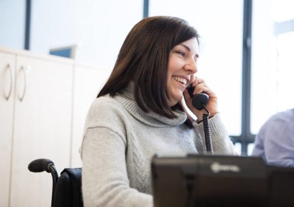 A member of Back Up staff answering the phone