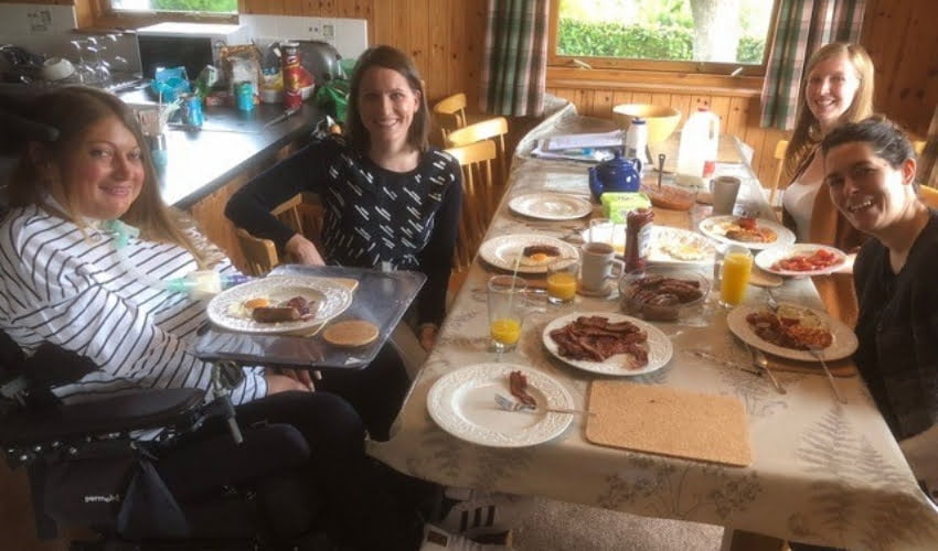 Hannah enjoying breakfast with her friends