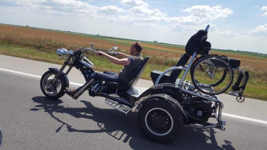 Guy riding a motor trike