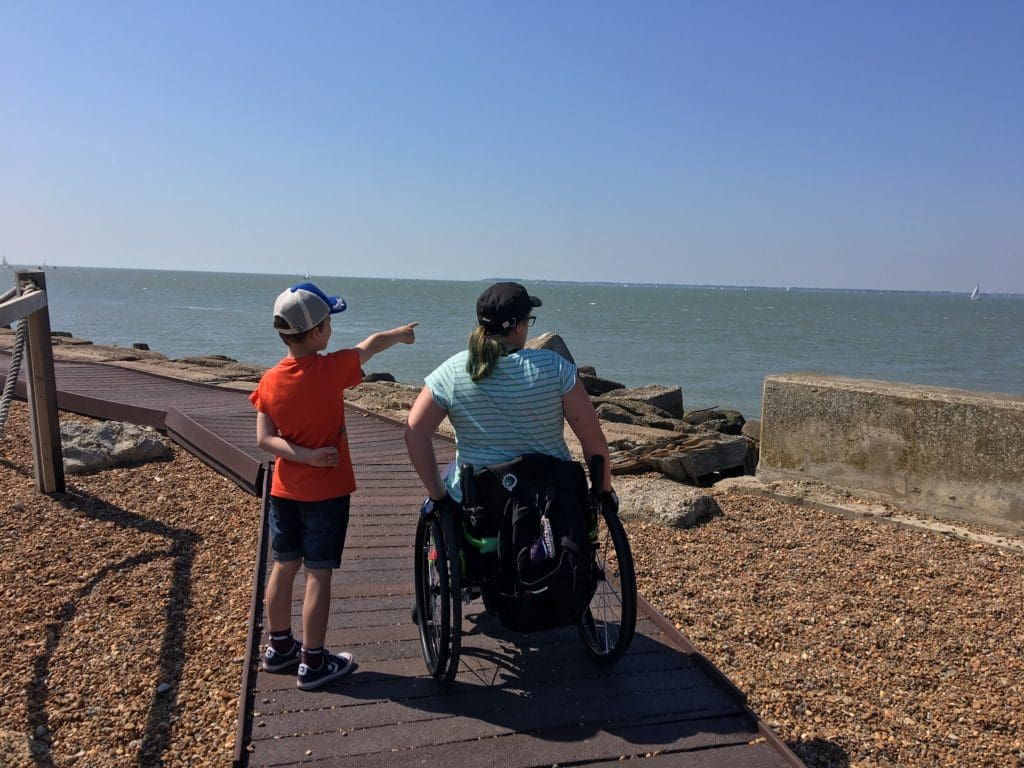 Natalie and her son enjoying family life at the beach