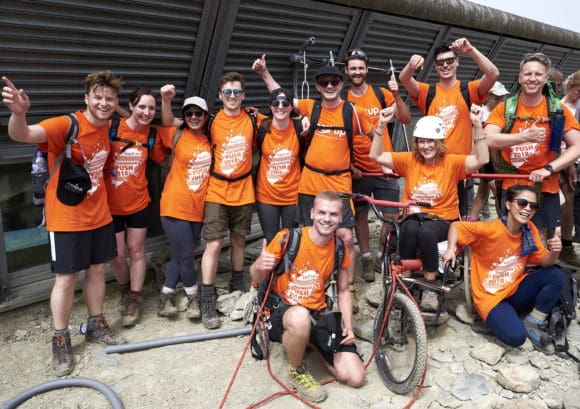 The "ACG Cliffhangers" team posing on Mount Snowdon during the Snowdon Push