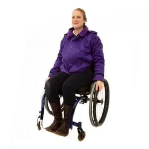 Wheelchair user wearing the purple waterproof jacket