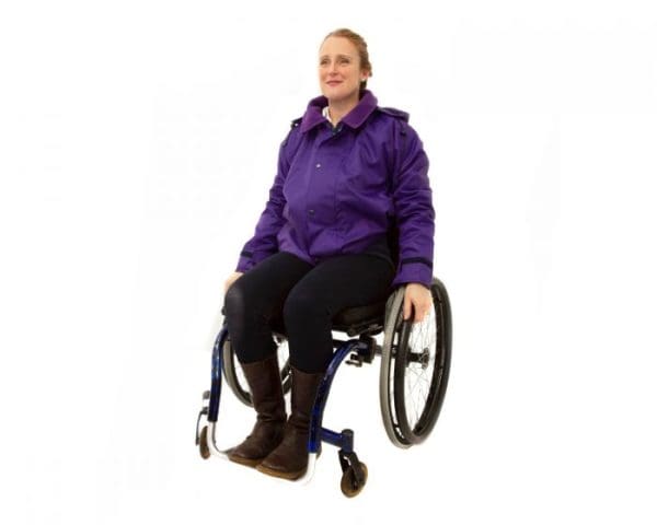 Wheelchair user wearing the purple waterproof jacket