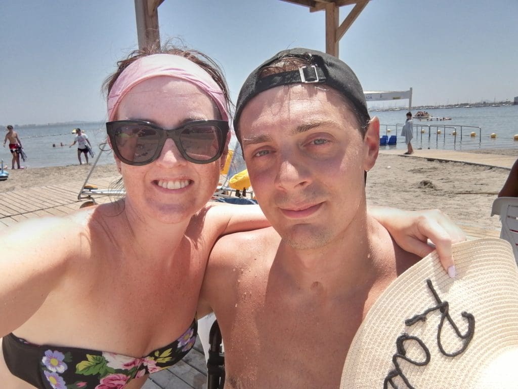 Sam, a family mentor, on holiday with her partner