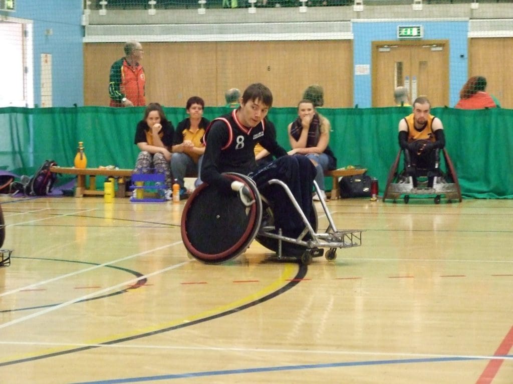 Sam playing wheelchair rugby