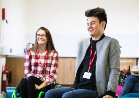 Two young wheelchair users