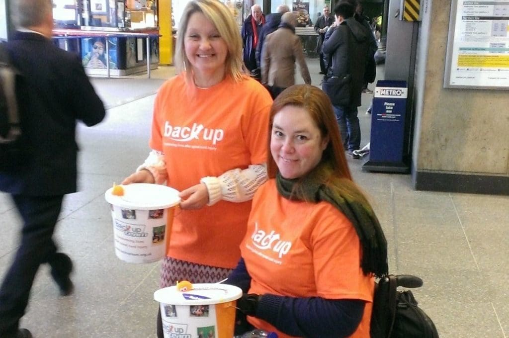 Michelle, this months Back up Star, posing at a bucket collection