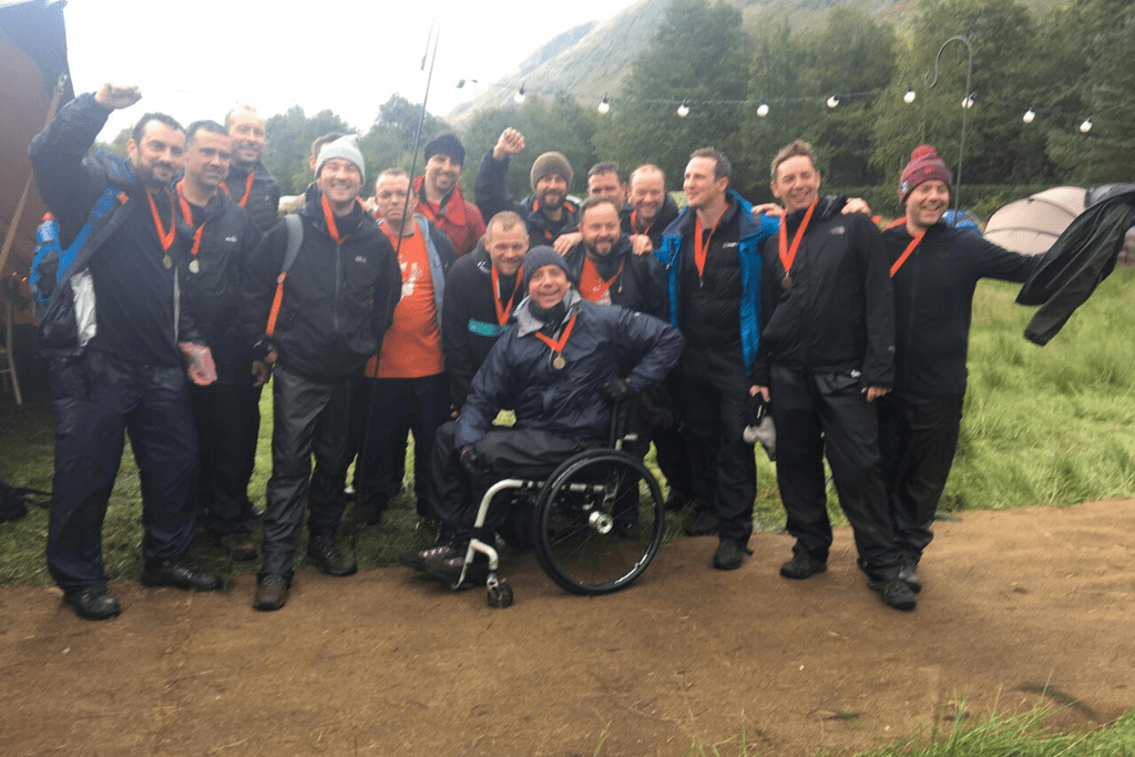 Andrew and his team celebrating after conquering the Ben Nevis push