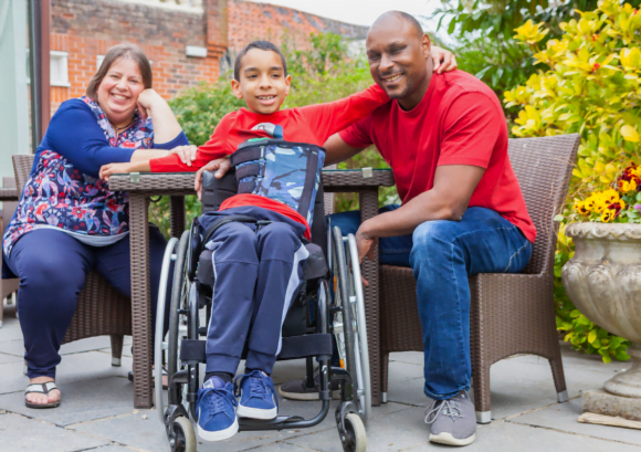 A family with a young person with a spinal cord injury. Join our Youth Break Out Lounges for support.
