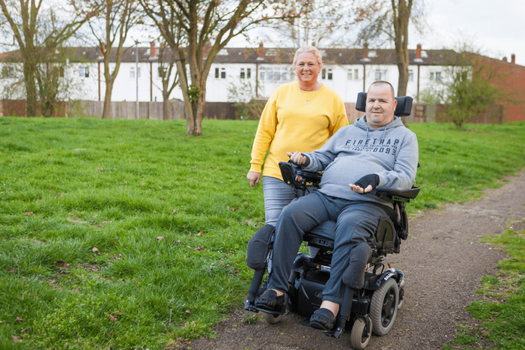 A power chair user out and about - read this article to learn how to prevent pressure ulcer