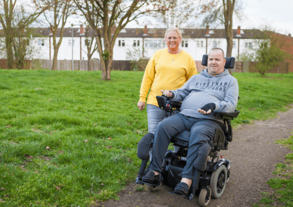 A power chair user out and about - read this article to learn how to prevent pressure ulcer