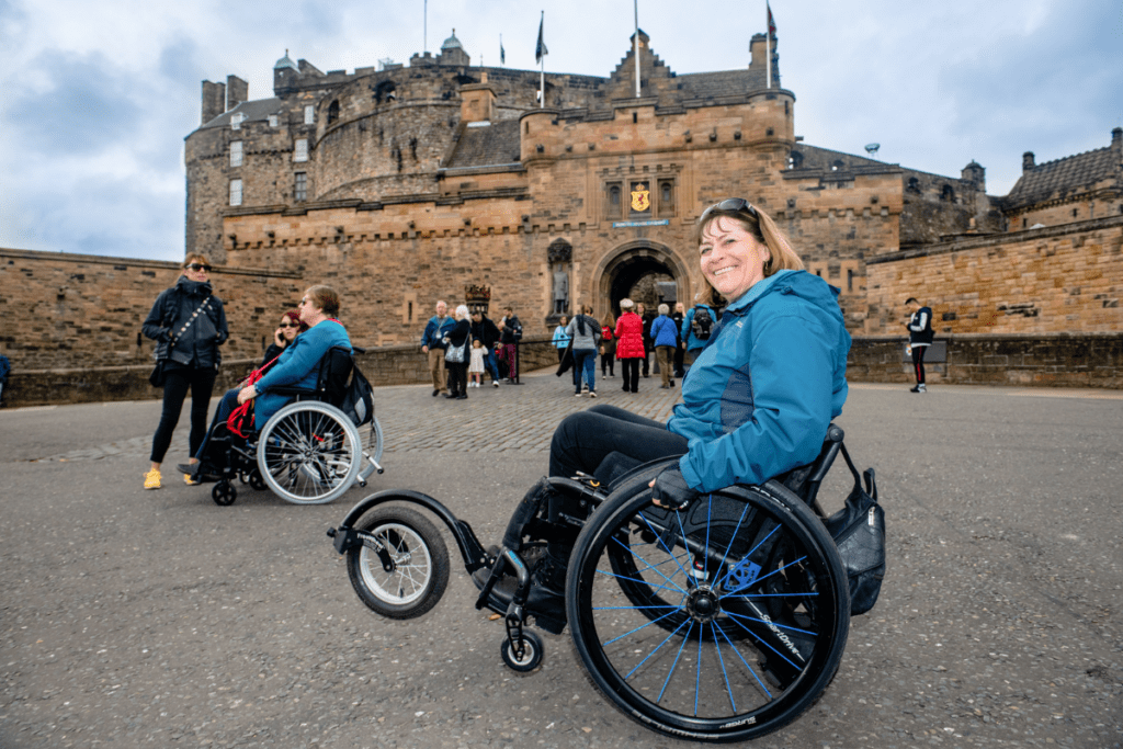 Julie, who has been a Back Up volunteer for 30 years, demonstrating a back wheel balance