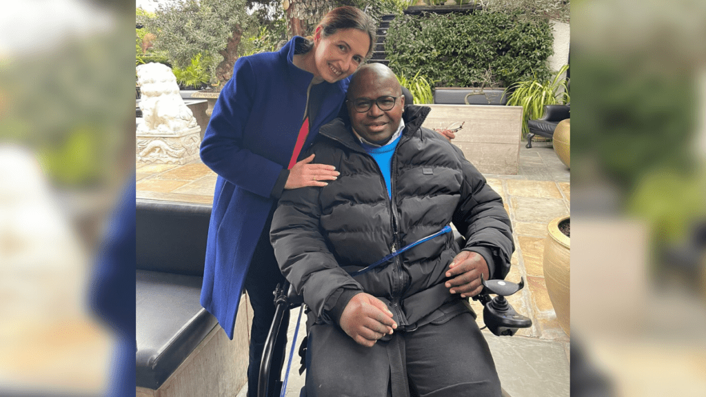 Sophie posing for a photo with her husband Kay who sustained a spinal cord injury in lockdown