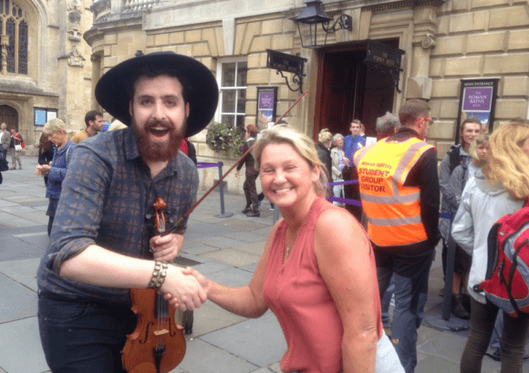 Michelle, this month's Back Up Star, posing with a busker on our Next Steps course