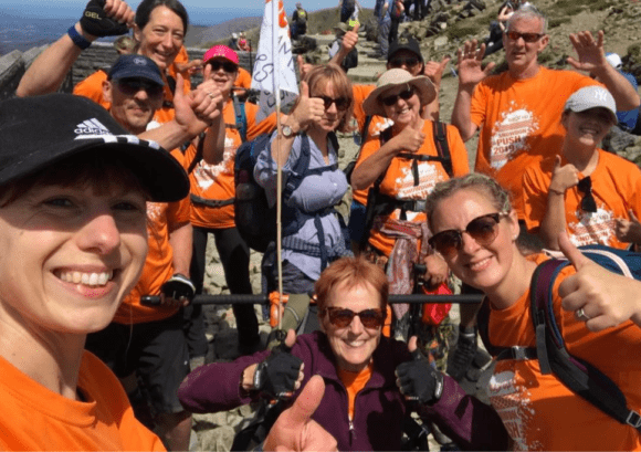 Sue, with her team on top of Mount Snowdon