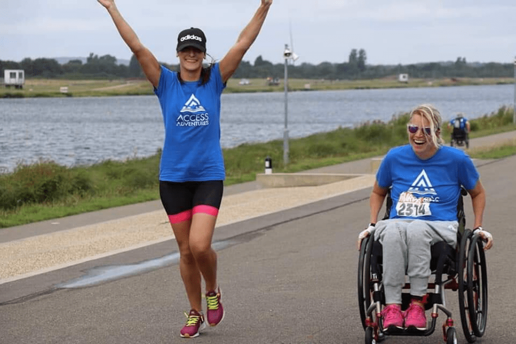 Melissa pushing a race with her personal assistant 