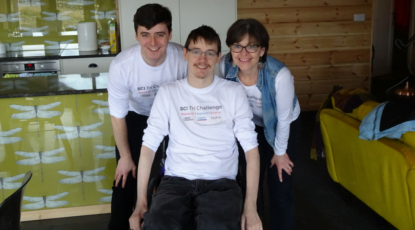 Sam, Sarah and Andrew smiling while wearing their SCI Tri Challenge t-shirts