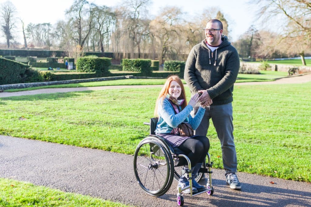 Richard, one of our family mentors, taking a walk through a park with his wife Zoe