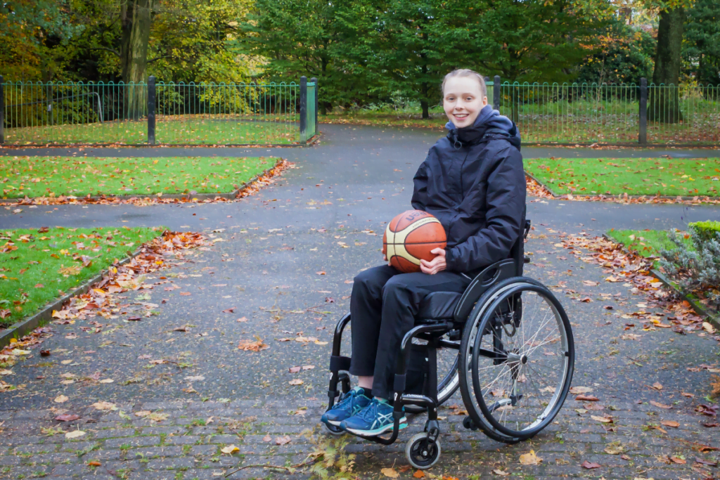 Hannah, a young person with a spinal cord injury we interviewed for our impact report