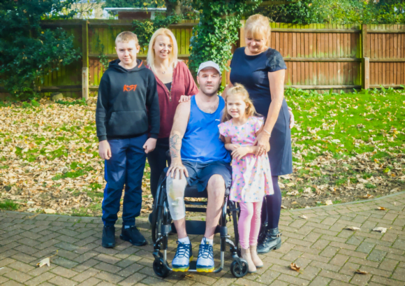 Lorraine with her son Christopher who we supported after spinal cord injury. read our impact report to hear their story