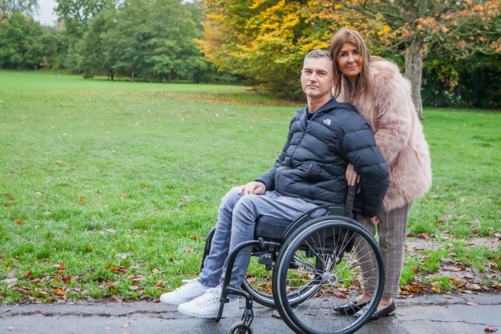 Terry, a wheelchair user, and his partner. Read on for his 2020 impact report story.