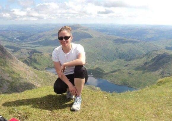 Anita on a mountainside. Anita recently did our Spinal Circuit challenge.