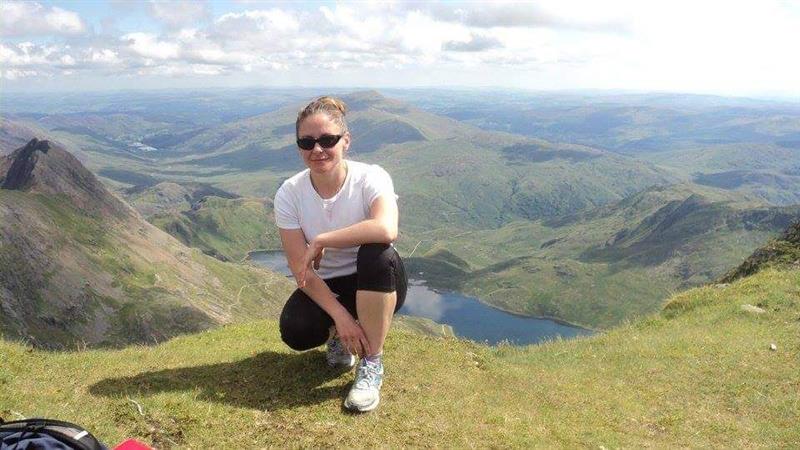 Anita on a mountainside. Anita recently did our Spinal Circuit challenge.