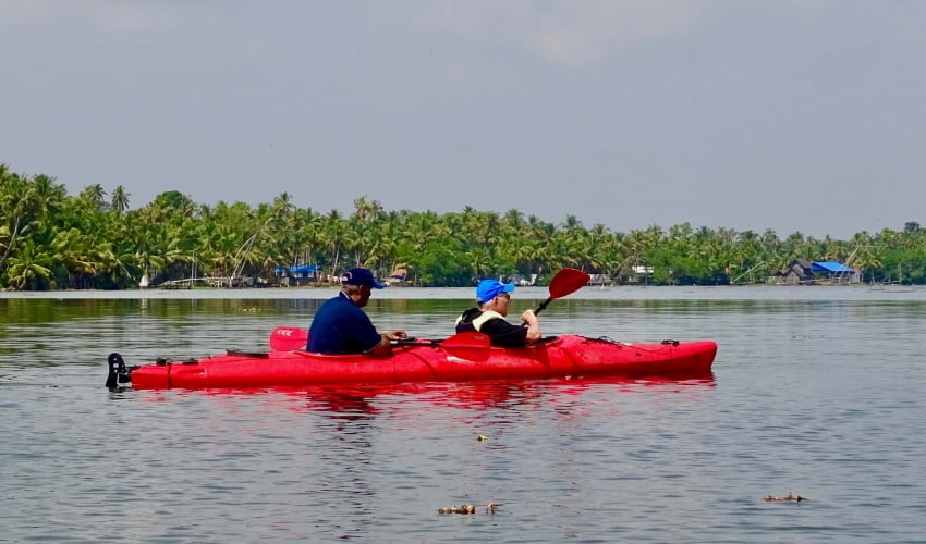 John canoeing on a lake 