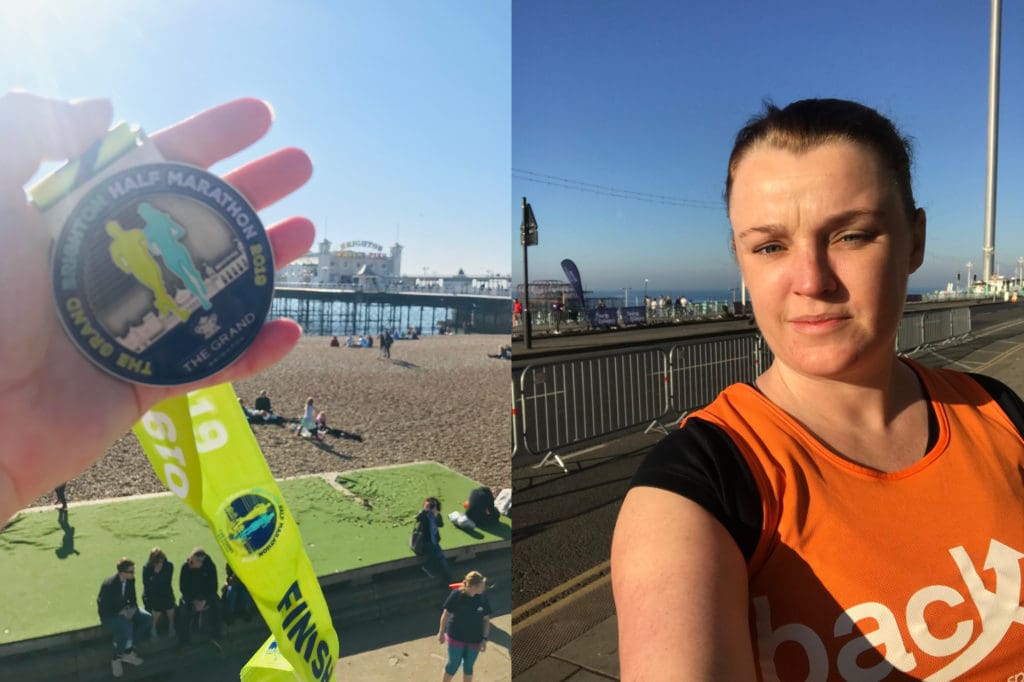 Lisa and her finishers medal at the Brighton half marathon