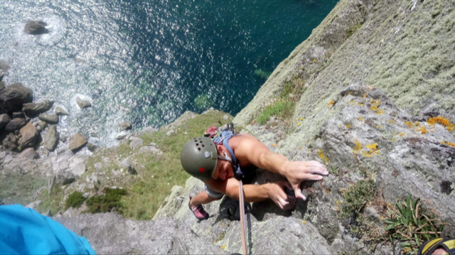 Peter, who has a spinal cord injury but can walk, climbing a rock face