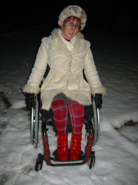 Sharon in her garden on a snowy night