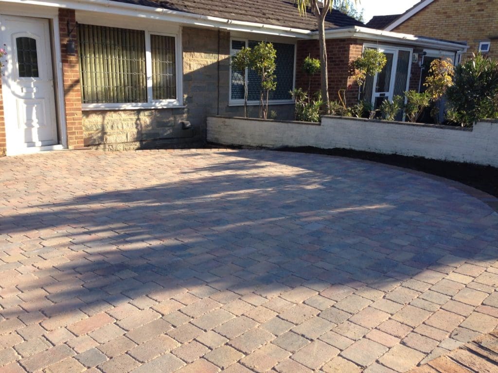 a photo of the front of Roger's house, showing the level driveway that allows him to push into his house 