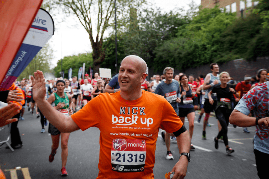 A runner enjoying a one of Back Up's running challenge events